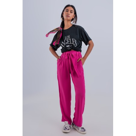 Pantalones fucsia de...